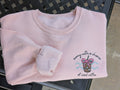 Sunny with a chance of iced coffee embroidered sweatshirt in blush pink