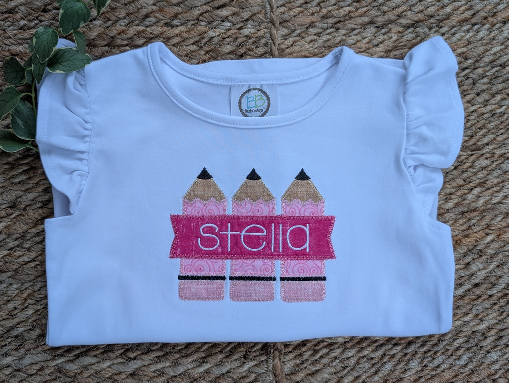 White girls ruffle sleeve tee with pink pencil applique and personalized name Stella