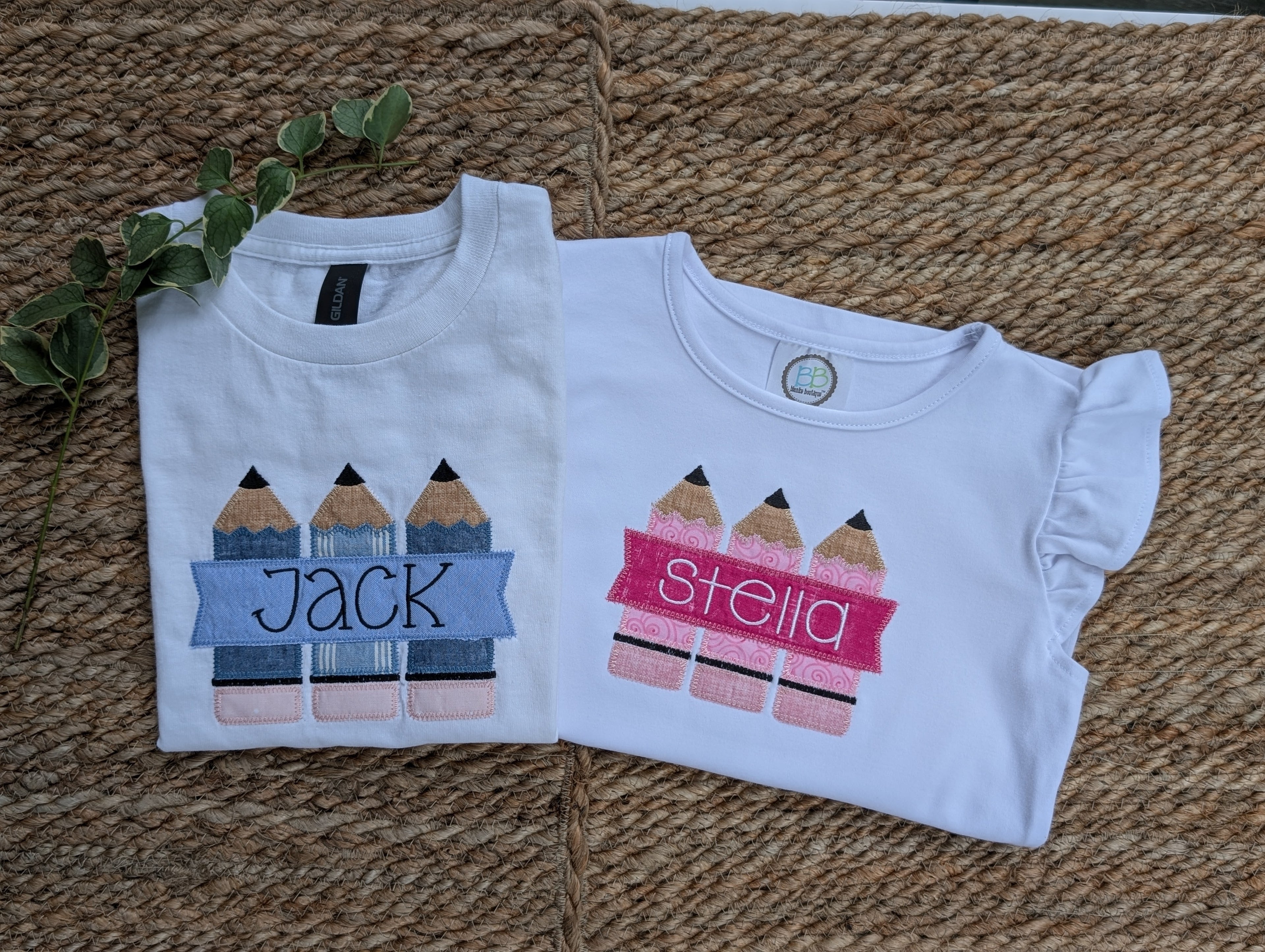Boys blue pencil tee and girls pink pencil ruffle tee side by side showing sibling set