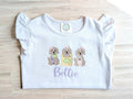 Puppy trio embroidered personalized tees, Stella and Bettie, folded flat lay