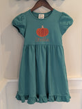 Close-up of pumpkin applique with embroidered name