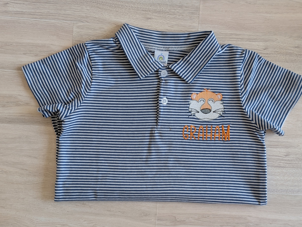 Navy and white striped boys' polo with tiger mascot and sample name Graham