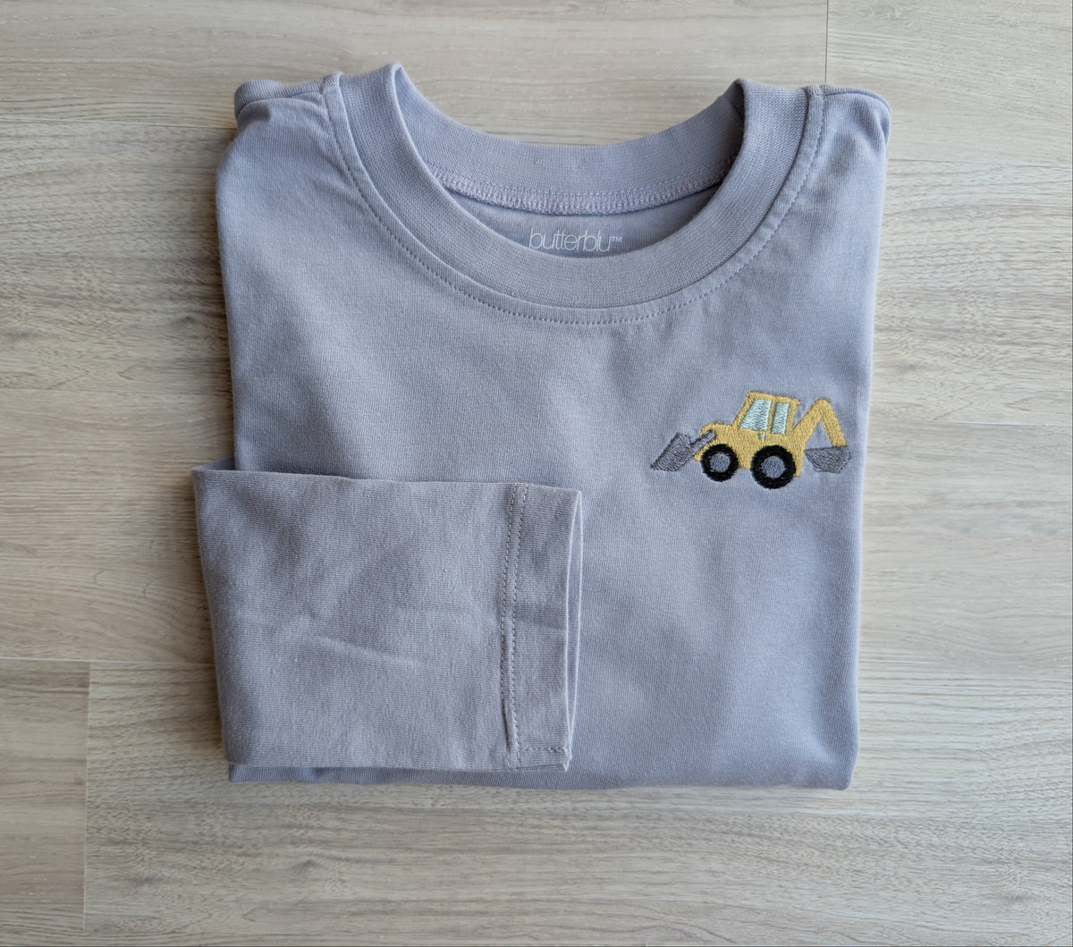 Blue-gray size 5T long-sleeve shirt with yellow backhoe embroidery on the chest