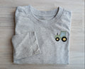 Ash-gray size 5T long-sleeve shirt with green tractor embroidery on the chest