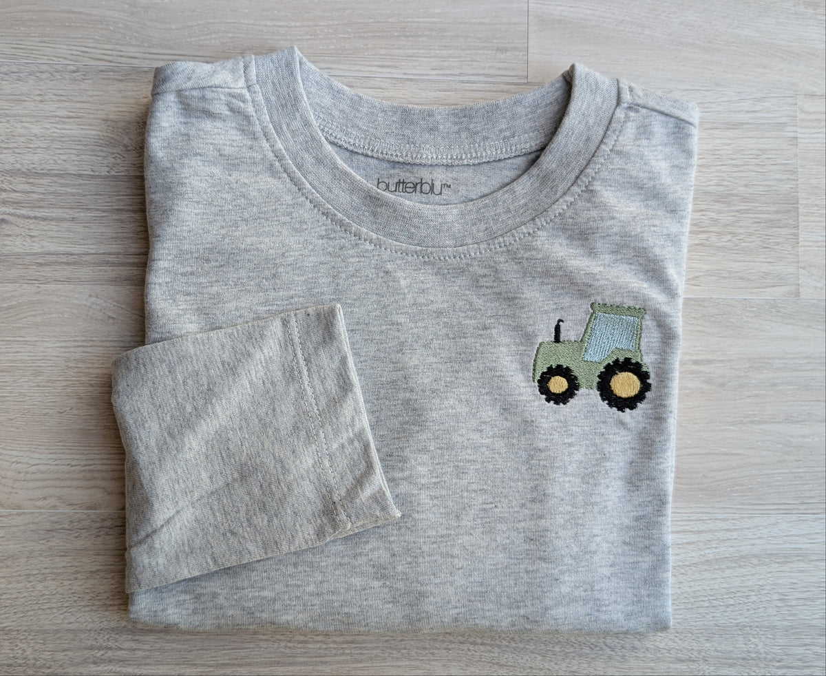 Ash-gray size 5T long-sleeve shirt with green tractor embroidery on the chest