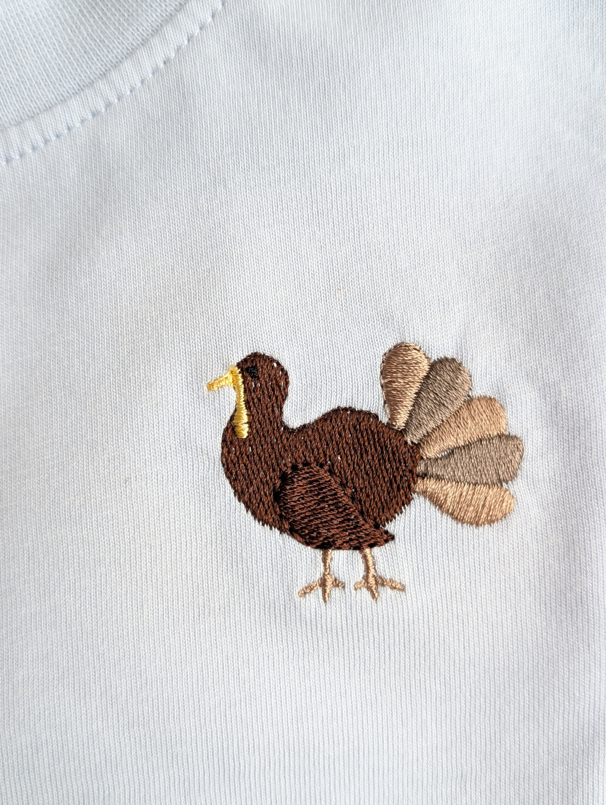 Animal embroidery detail from Frost Pack shirt collection