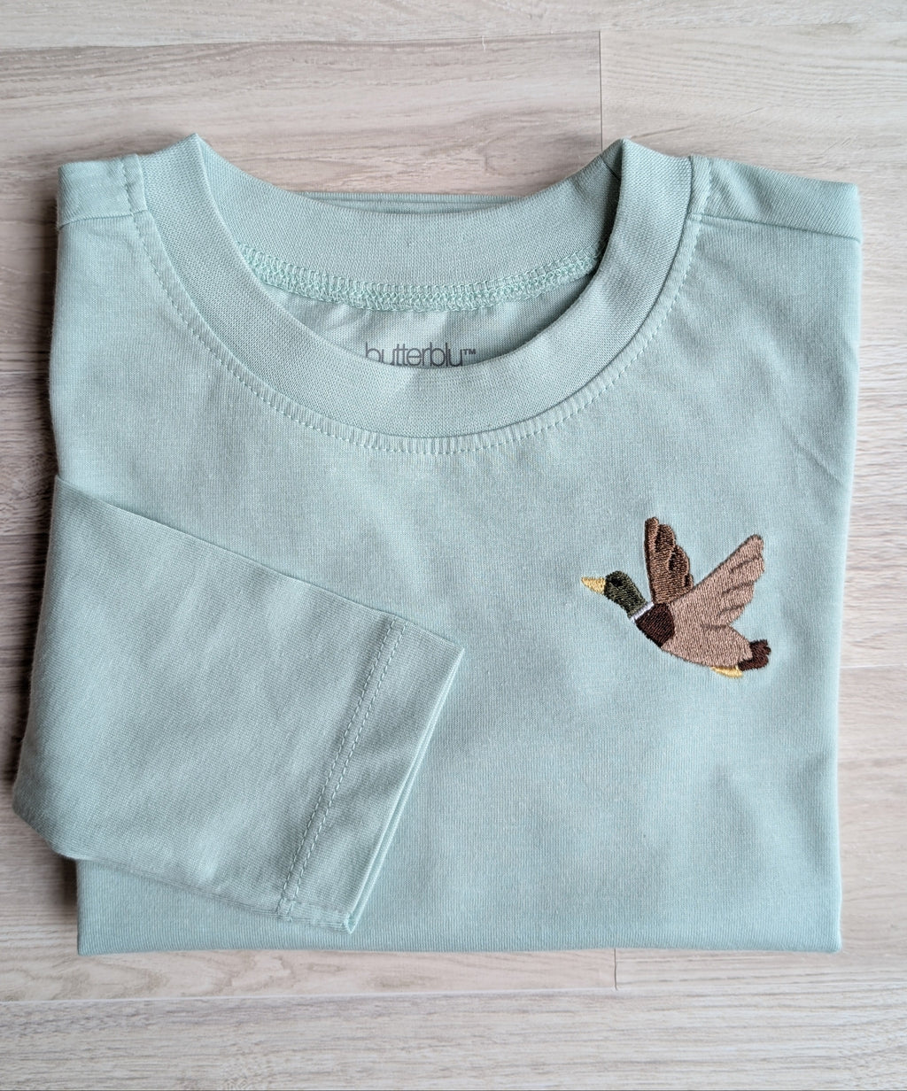 Light blue long-sleeve shirt with flying duck embroidery