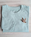 Light blue long-sleeve shirt with flying duck embroidery