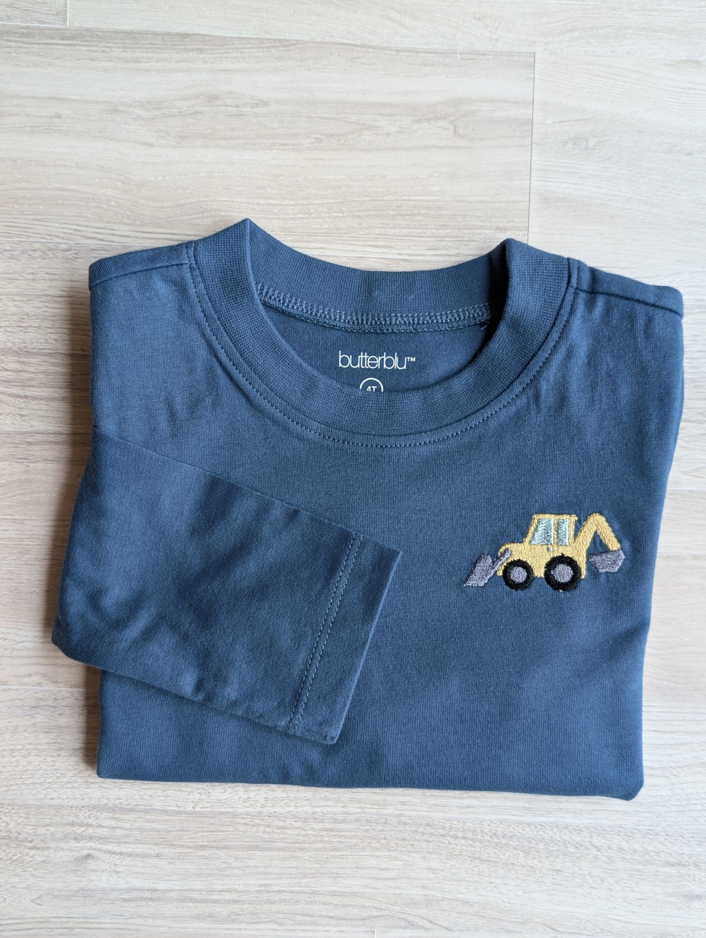 Transportation embroidery on long-sleeve organic cotton shirt
