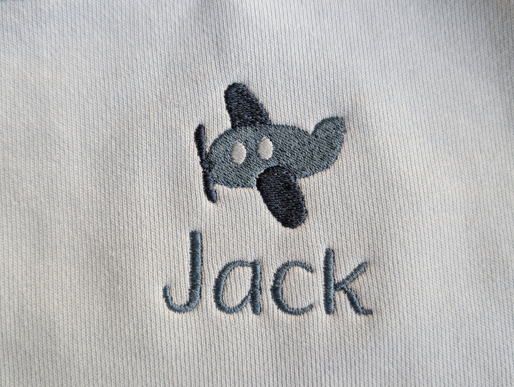 Navy crewneck sweatshirt with dog icon and Jack in script lettering